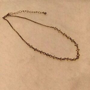 Delicate goldtone choker necklace with clear rhinestones‎